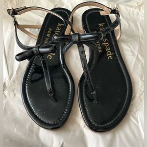 Kate Spade Glossy Black Sandals with Bow Accent